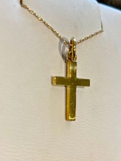 This cross, made by BPJ, is solid 14k yellow gold and measures 17mm in length. Chain not included. Classic 14k Gold Crucifix Jewelry And Charms, Classic 14k Gold Crucifix Jewelry, Classic 14k Gold Cross Pendant Necklace, Classic 14k Gold Cross Necklace, Classic Yellow Gold Cross Necklace, Formal 14k Gold Cross Jewelry And Charms, Yellow Gold Cross Pendant Stamped 14k, Yellow Gold 14k Stamped Cross Pendant, Yellow Gold Polished Cross Necklace Pendant