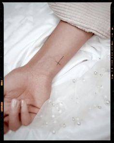 Simple cross wrist tattoo Beautiful Wrist Tattoos, Inner Wrist Tattoos, Wrist Tattoos Words, Infinity Tattoo On Wrist, Simple Cross Tattoo