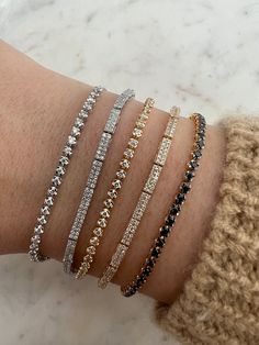 Shine all day in this modern and trendy take on our classic tennis bracelet. Available in 14K Yellow Gold, 14K White Gold & 14K Rose Gold Diamonds are G/H SI Cttw: 0.50 All 14K items can be exchanged, no returns Rose Gold Black Diamond, Ring Stacks, Black Diamond Bracelet, Accesories Jewelry, Tennis Chain, Diamond Tennis Bracelet, Black Sapphire, Elegant Nails, Tennis Necklace