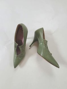 NEW Green 50s stilettos, size 6, sage green, leather soles, AMAZING cutouts, 4" heel Unicorn shoes What a beautiful pair of amazing shoes! I'd keep them if they fit! Size 6 Sage green New, never worn. Giancarlo, Italy  Unbreakable heel Leather Leather soles Insole 9.5 Ball of foot across 2.5 Heel 4" high 50s Heels, Unicorn Shoes, Fun Pants, New Green, Green Leather, Womens Oxfords, Womens Heels, Italian Leather, Women's Pumps