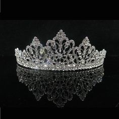 a tiara is shown on a reflective surface