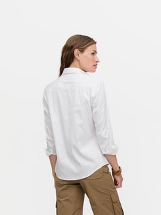 STRETCH WHITE BROADCLOTH Our menswear inspired Weekend Shirt in a white stretch broadcloth. Trying to decide on the perfect white shirt? Check out the Sarah Alexandra White Collection Shirt Guide! White Relaxed Fit Dress Shirt For Office, White Spread Collar Blouse For Work, White Cotton Dress Shirt For Work, White Slim Fit Tops For Business Casual, White Relaxed Fit Collared Dress Shirt, White Unstructured Button-up Top, Unstructured White Button-up Top, White Shirt With Placket For Work, Classic White Slim Fit Blouse