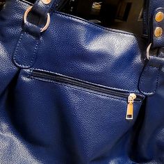 Brand New Faux Leather Deep Blue Satchel Handbag. It Has A Generous Center Opening With Lots Of Pockets, Zipper Side Pockets, An Exterior Zipper Pocket And Functional Belt Adjustments On Each End. It Has Both The Wide Strap Double Handle And Includes A Shoulder Strap And Bling To Place On The Bag. All Hardware Is Gold Tone. Blue Faux Leather Shoulder Bag For Everyday Use, Blue Faux Leather Shoulder Bag, Blue Faux Leather Bags For Daily Use, Blue Faux Leather Bag For Daily Use, Blue Faux Leather Travel Bags, Trendy Blue Faux Leather Bag, Marc Jacobs Tote, End It, Leather Shoulder Handbags