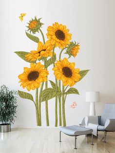 the sunflowers are painted on the wall in this living room, with two chairs and a potted plant