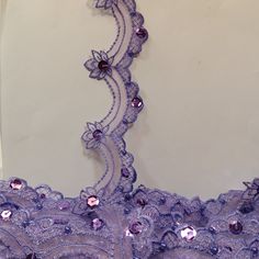 Beaded Lilac Lace Trim Embroidered on 100% Polyester Organza . Large Arch Scalloped Trim. Formal Trim. Perfect for Edging and Gowns.  Sold by the Yard.  Lace Usa Purple Embroidered Wedding Gown, Fitted Beaded Lace Embroidered Fabric, Embroidered Lace Prom Gown, Embroidered Lace Gown For Prom, Embroidered Fitted Lace For Party, Fitted Embroidered Lace For Party, Purple Lace Dress With Intricate Embroidery, Purple Embroidered Organza Fabric For Party, Purple Embroidered Organza Fabric For Wedding