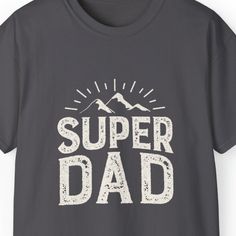 Show your appreciation for the super dad in your life with our 'Super Dad Men's Tee.' This stylish and comfortable Father's Day T-shirt features a striking mountain landscape background, making it the perfect gift for adventurous dads. Whether he's conquering mountains or simply being the superhero dad at home, this tee celebrates his strength and love. Available in various sizes, it's a thoughtful and meaningful gift for Father's Day or any occasion. Order yours today and let your super dad wea Father's Day Outdoor T-shirt With Graphic Print, Father's Day Outdoor Graphic Print T-shirt, Father's Day Outdoor Graphic T-shirt, Mountain Tee, Landscape Background, Super Dad, Father's Day T Shirts, Mountain Landscape, Gifts For Father