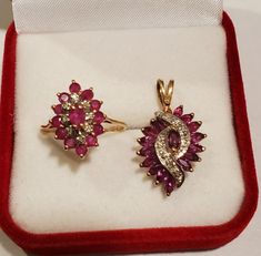 Matching 14K & 10K Solid Gold Ring & 1" Pendant Set Diamond Red Rubies sz6.5 I'm not sure if these were originally a pair, but they are a near perfect match for each other. The gorgeous pendant features nice pink/red rubies and diamonds in 10k gold with a matching rubies and diamond ring. The perfect set! (no necklace chain included) Total ring weight 2.2g Acid tested Gold Total pendant weight 2.67g Acid tested Gold Rubies and diamonds tested.. (ungraded) Any questions just ask. Pendant Set Diamond, Rubies And Diamonds, Diamond Red, Solid Gold Ring, Solid Gold Rings, Ruby Diamond, Necklace Chain, Pendant Set, 10k Gold