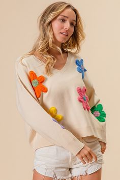 Details Brand: BiBi Lightweight Knit Sweater Solid Color Soft Material Multi Color Crochet Flower Patches on Front V Neckline Long Sleeves Ribbed Cuffs Ribbed Hem Material 50% Rayon 28% Polyester 22% Nylon Care Instructions Hand Wash Cold, Lay Flat to Dry, Low Iron Measurements of Garment Bust of the garment is measured armpit to armpit and then doubled. Length of the garment is measured from the top of the shoulder to the bottom of the hem line. Sleeve Length of the garment is measured from the Beige Soft Knit Sweater For Spring, Beige Knit Sweater For Spring, Spring Cream Knitted Sweater, Spring Cream Cotton Sweater, Spring Cream Knit Sweater, Cream Knit Sweater For Spring, Cream Cotton Sweater For Spring, Trendy Cream Sweater For Spring, Casual Spring Sweater With Crochet Trim