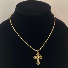 "The Heart Cross Necklace 🤍 Featuring a unique gold cross with heart details and an 18k gold plated stainless steel oval ball chain. shower proof!  Unisex & tarnish proof- 16\" 🖤 each will come with an extender for adjustability.  Made with love 🫶" Big Gold Cross Necklace, Gold Cross Necklace With Figaro Chain, Gold Metal Cross Necklace As Gift, Gold Metal Cross Necklace With Adjustable Chain, Gold Cross Necklace With Delicate Pendant, Gold Cross Pendant Necklace With Chain, Gold Chain Cross Necklace As A Gift, Gold Pendant Cross Necklace With Chain, Gold Metal Crucifix Cross Necklace