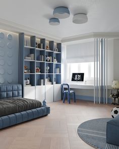 a blue and white bedroom with a soccer ball on the floor