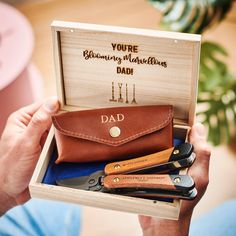 This is the perfect Father's Dad Gift for those Dads who love gardening. Our handmade leather holder attaches to any belt and keeps a handy gardening tool close at hand. The personalised box is tied with navy ribbon, so it really has the wow factor when it's opened. The personalisation makes it extra special. We can hot-stamp "Dad's Blooming Marvellous!" in vintage gold, which looks great, but if you would prefer initials, name or your own short message then we can easily do it for you in no tim Garden Tool Holder, Hot Stamp, Navy Ribbon, Unique Gifts For Dad, Garden Tool Set, Wooden Gift Boxes, Short Message, Gardening Tools, Buffalo Leather