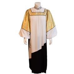 a white and black priest's robe with gold trim