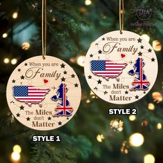 two christmas ornaments hanging from a tree with lights in the background and text that reads, when you are family, the miles don't matter matter matter style 2