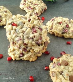 cookies with cranberries and chocolate chips on a baking sheet