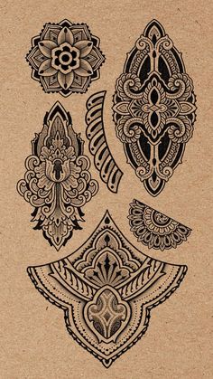 an image of some fancy designs on a piece of brown paper in black and white