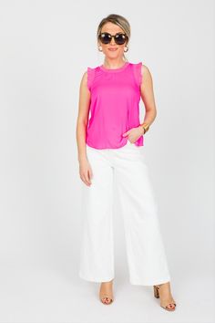 This bright pink top is simple in style with just enough detail to stand out! The body is a smooth and sleek woven material with a ribbed contrast on the edge of the shoulders and neckline. Layer it under a blazer for the work week, then wear it alone with cut offs or white denim in the spring! Pink Spring Tops For Workwear, Pink Spring Workwear Top, Pink Top For Spring Workwear, Pink Spring Top For Work, Stretch Pink Tops For Workwear, Pink Stretch Tops For Work, Cut Offs, Blue Door, Work Week