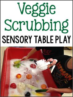 a child is playing with vegetables in a plastic tray and the words veggie scrubbing on it