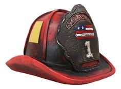 a fireman's hat with the number one on it and an american flag