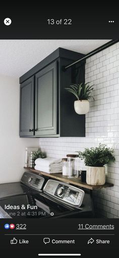 a black and white laundry room with lots of plants on the shelf next to the washer