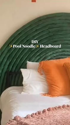 a bed with orange pillows on it and the words diy foot noodle headboard