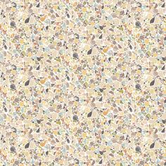 a white and yellow wallpaper with many different colored dots on it's surface