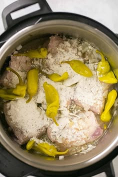 the food is being cooked in the pot on the stove