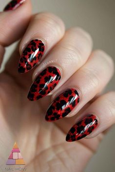 Get fierce with these tiger stripe-inspired red and black nails. Perfect for those who love a unique and wild look. Save this pin and discover more fabulous designs on nailhow.com! #TigerStripeNails #RedNails Tiger Stripe Nails, Red And Black Nails, Tiger Nails, Goth Nails, Red Nail Designs