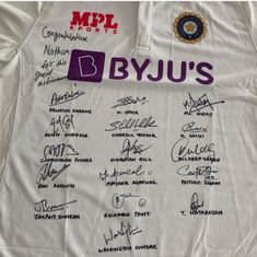 a jersey with autographs on it and the names of players in each team's name