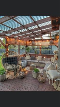 an outdoor living area with wicker furniture and string lights on the ceiling is featured in this instagram