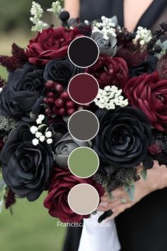 a bridal bouquet with black and red flowers