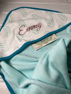 Bebe' & Bugaboo Boutique offering a very adorable embroidered Bath hooded towel with your adorable baby's name on it. →→The pictures show the sweet teals, aqua, and grays and we can add an embroidered name or 3 initial monogram on the hood. You get 1 first name or up to 3 monogrammed initials on this listing. May be additional fees for longer names or designs added.  Convo me with any questions. Included in this listing is: → first name, 3 Intls or nickname. Additional fees may apply for additional letters, words, or designs. 1 hooded towel (nice quality and size)    Approx 30 X 30 Inches    Machine Washable Notes to seller: Color of thread & 1 Name or nickname NKDs exclusive If not specified it will default to the designer's choice All orders are nc/nr/nr Baby Bath Towel, Hooded Bath Towels, Hooded Towels, Embroidered Name, Embroidered Gifts, Initial Monogram, Hooded Towel, Personalized Baby Gifts, Gift Boutique