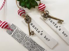 three key tags with the words santa's key on them