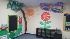 the classroom is decorated with very colorful murals