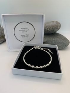 "ITEM DESCRIPTION  This lovely beaded bracelet is made using 3mm sterling silver beads and 7 larger round sterling silver beads which represent 7 decades.  This bracelet is also available in any other milestone birthday - if you can't find what you are looking for please message me and I will be happy to help. There is a choice of silver or rose gold vermeil for the round beads and can be mixed and matched.  The beads are threaded on to the highest quality beading wire making it very strong with Happy 70 Birthday, Birthday Bracelet, 70th Birthday Gifts, 16th Birthday Gifts, 60th Birthday Gifts, Milestone Birthday, Beading Wire, 70th Birthday, Milestone Birthdays