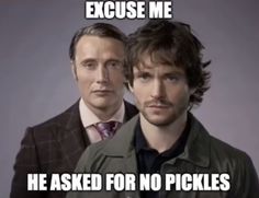 two men standing next to each other in front of a sign that says because he asked for no pickles