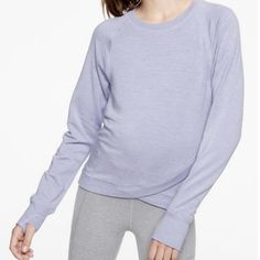 Athleta Girl Violet Blue Long Sleeve Criss Cross My Heart Sweatshirt Brand New - Without Hang Tag, The Label Inside Is Partially Covered To Prevent Return To The Retail Stores. Material - 65% Polyester 35% Viscose Purple Relaxed Fit Sporty Tops, Lavender Athleisure Activewear For Loungewear, Lavender Sporty Activewear For Loungewear, Blue Crew Neck Top For Light Exercise, Purple Go-dry Athleisure Top, Casual Heather Sports Tops, Purple Sporty Yoga Tops, Sporty Purple Yoga Tops, Purple Athleisure Tops For Sports