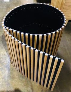 a wooden table with black and white stripes on it