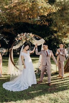 a bride and groom walking down the aisle