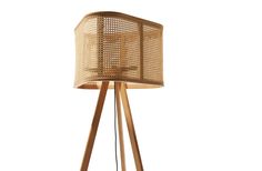 a wooden floor lamp with a rattan shade on it's top and legs