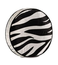 a black and white zebra print round pillow