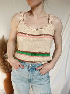 Introducing our Multi-Color Crochet Sweater Tank, a relaxed fit top with a touch of luxury. The watermelon striped pattern and crochet knit add a playful yet sophisticated twist, while the intricate thread detail enhances the overall design. 60% cotton 40% acrylic Brooke is 5'4" 120lb wearing the small for reference. We recommend your true size Small: underarm to underarm 17.5" Medium: underarm to underarm 18.5" Large: underarm to underarm 19.5" Striped Crochet Sweater, Jumpsuit Jacket, Sweater Tank, Crochet Sweater, Dress Romper, Workout Tops, Sweater Jacket, Stripes Pattern, Watermelon