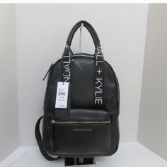 Kendall + Kylie Large Backpack Has 2 Pockets On Inner Front Wall And 1 Large Pocket On Inner Backwall Zip Pocket On Outside Zip Enclosure Height 15.5 Inches Approximately Width 10.5 Inches Approximately Depth 5 Inches Approximately Nwt Adjustable Straps Everyday Bags With Detachable Strap For Back To School, Everyday Back To School Bag With Detachable Strap, On-the-go Bags For Back To School, On-the-go Back To School Bags, Kylie Bags, Fur Backpack, Yellow Backpack, Camo Backpack, Green Backpacks