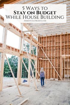 a woman standing in the middle of a house under construction with text overlay that reads 5 ways to stay on budget while building