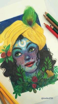 a drawing of a woman with flowers and leaves on her head, surrounded by colored pencils