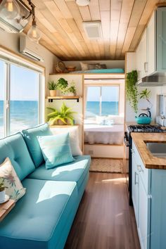 a blue couch sitting in the middle of a kitchen