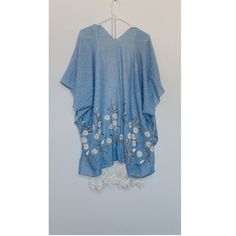 Spring Daisy Kimono Embroidered Floral Spring Summer Cover Up Bohemian spring daisy is reimagined in this kimono with boarder daisy embroidery the midi-length hem. Wrap yourself in a dream as this light, cool fabric has a whisper of sheerness and a smooth, luxe feel. Traditional kimono styling features an open front, side slits, and wide elbow sleeves. Embroidered V-neck Kimono For Spring, Spring Floral Embroidered Kimono With Kimono Sleeves, Spring Floral Embroidery Kimono With Kimono Sleeves, Summer Floral Embroidered Kimono With Kimono Sleeves, Summer Kimono With Floral Embroidery And Kimono Sleeves, Spring Cotton Kimono With Floral Embroidery, Summer Kimono With Floral Embroidery, Spring Vacation Kimono With Floral Embroidery, Spring Beach Kimono With Floral Embroidery