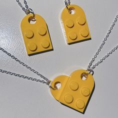 Yellow Lego Heart Necklace Includes 2 Separate Necklaces That Connect To Form A Heart :) Super Cute For Couples Or Best Friends! Each Chain Is 18 Inches And Silver Plated, With Lobster Clasps (Available To Ship Within 1-5 Business Days Of Purchase) #Lego #Heart #Necklace #Legohearts #Gift Yellow Heart-shaped Jewelry For Valentine's Day, Yellow Heart Beads Jewelry For Valentine's Day, Yellow Necklace With Heart Charm For Gift, Yellow Jewelry With Heart Beads For Valentine's Day, Valentine's Day Yellow Jewelry With Heart Beads, Yellow Heart Pendant Necklace For Valentine's Day, Lego Heart Necklace, Matching Couple Jewelry, Lego Heart