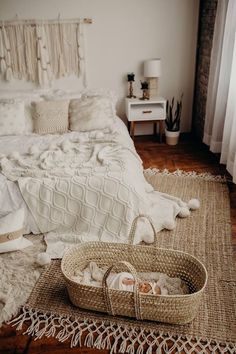 a bed room with a basket on the floor next to it and an instagram page