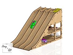 a wooden ski jump with green stickers on the top and bottom part, in front of a white background