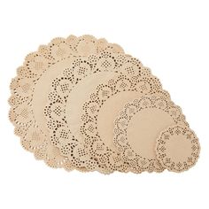 four pieces of doily are shown on a white background, one is beige and the other is light brown